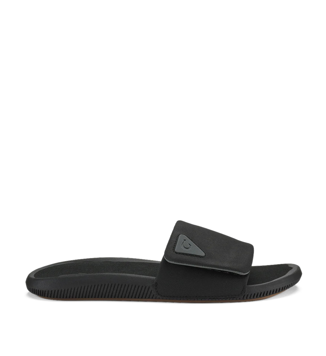House of Florian Olukai Ulele Lanai Lava Rock black slide sandal with adjustable strap and textured sole.