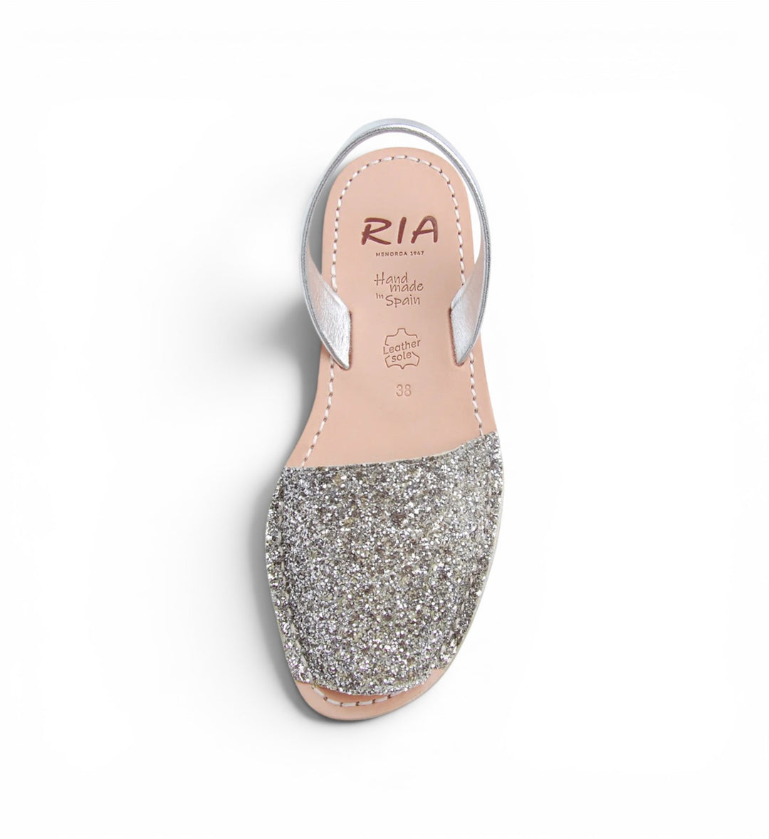 House of Florian Joan Avarcas glitter sandals in pewter with leather sole and slingback strap. Hand made in Spain.