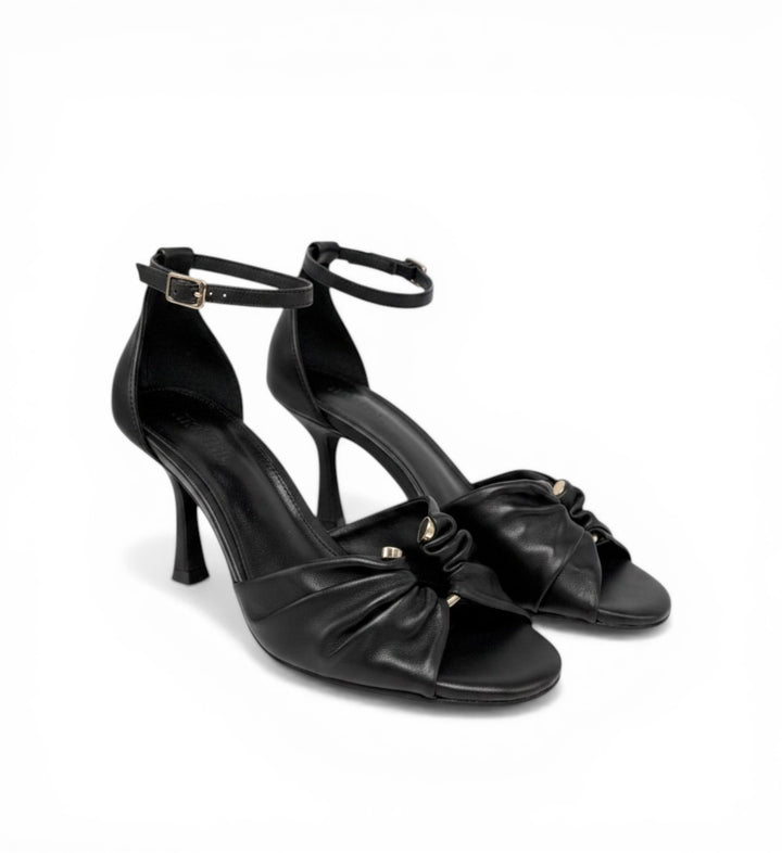 House of Florian Posy Black leather heeled sandals with ankle strap and ruched toe detail.