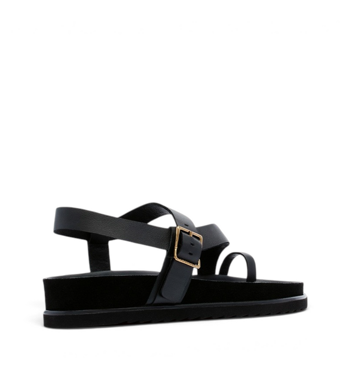 House of Florian Ren black leather sandal with a toe loop, adjustable buckle strap, and a thick cushioned sole.