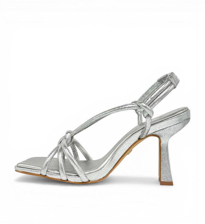 House of Florian silver metallic strappy square-toe heeled sandals with knotted detail and slingback strap.