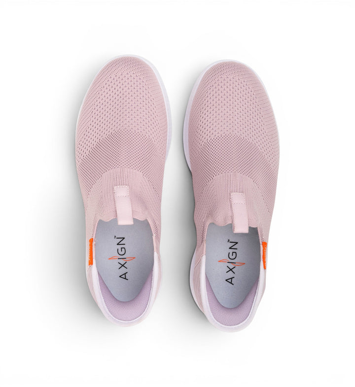 House of Florian Slipstream lightweight slip-on sneakers in pink knit with white soles and orange accents.