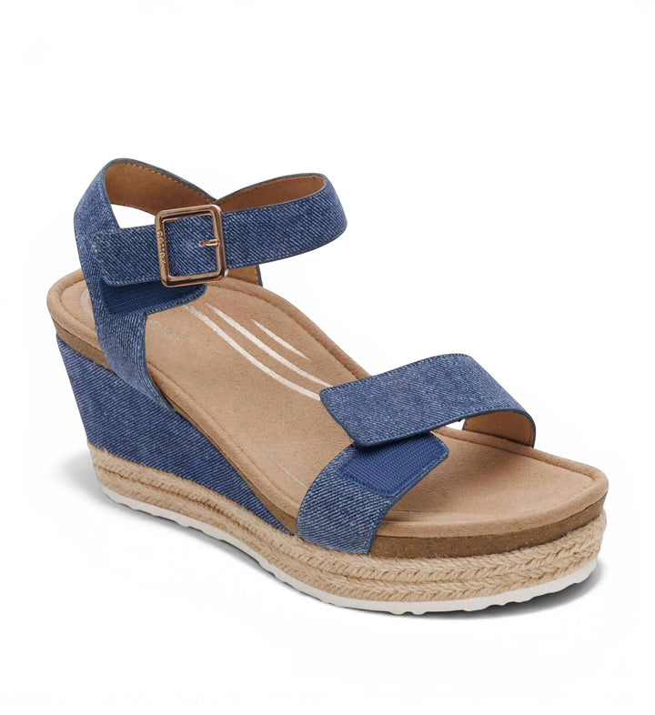 House of Florian Sydney Denim wedge sandals featuring blue denim straps, a gold buckle, and a jute-wrapped platform.