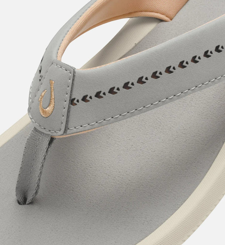 House of Florian Ulele flip-flops in ash grey with decorative cut-out detail and gold logo.
