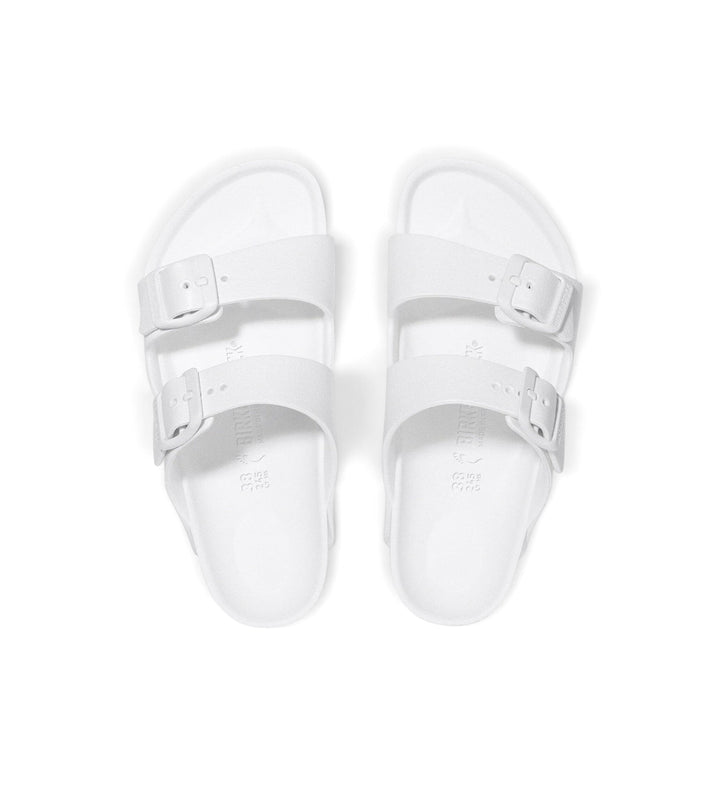House of Florian white Birkenstock Arizona kids EVA sandals with two adjustable straps and contoured footbed.