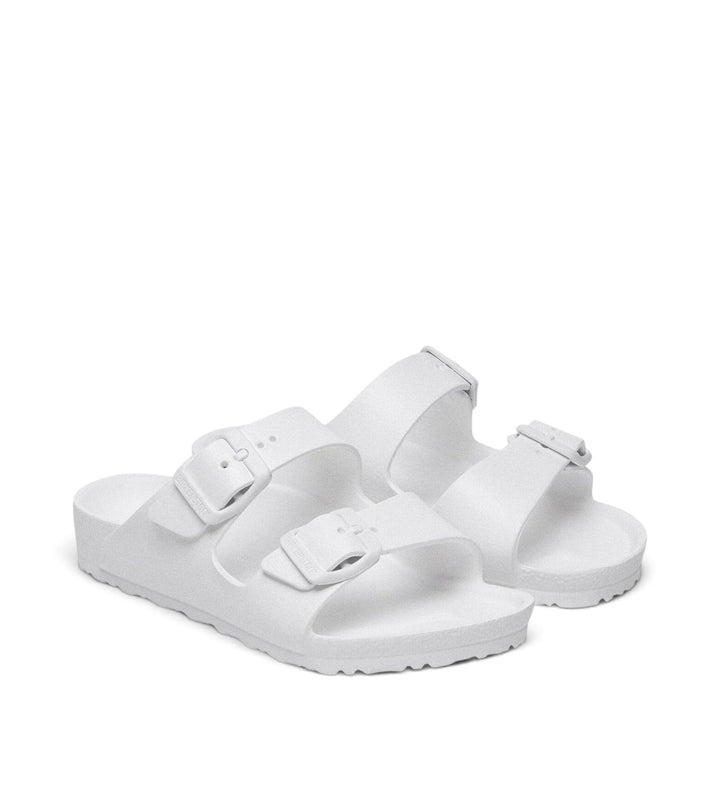 House of Florian white Birkenstock Arizona kids sandals made from lightweight waterproof EVA with two buckled straps.