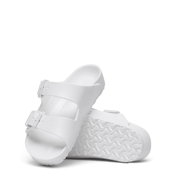 House of Florian white Birkenstock Arizona kids EVA sandals with two adjustable straps and contoured footbed.