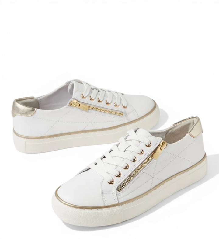 House of Florian white leather Pryor side zip sneakers with gold accents and quilted detail.