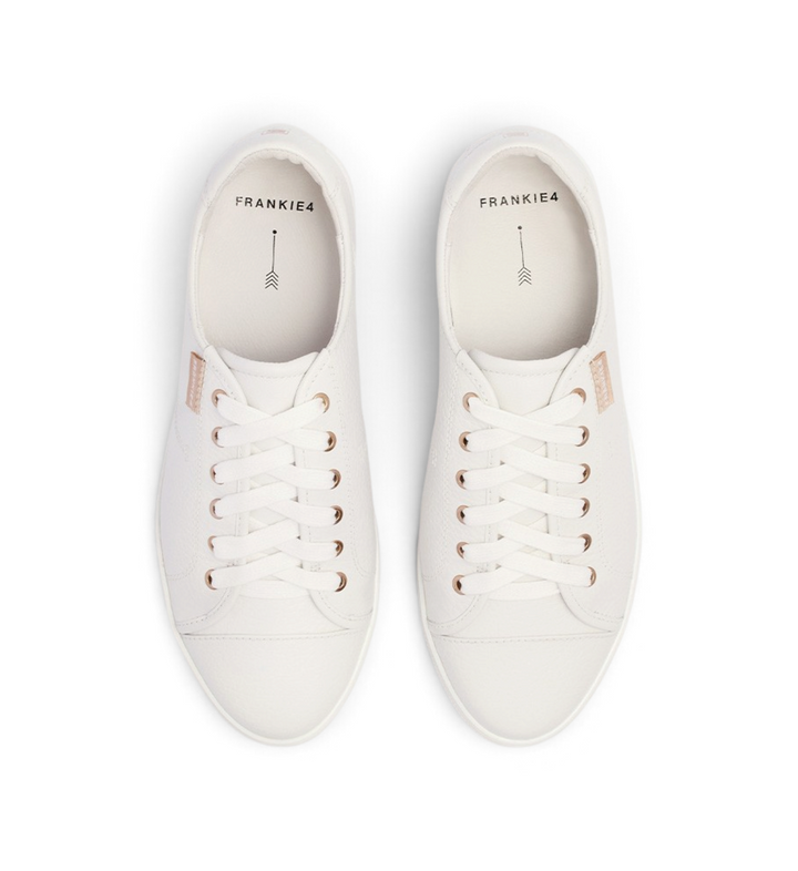 House of Florian Nat III white pebbled leather sneakers with rose gold eyelets and lace-up closure, top view.