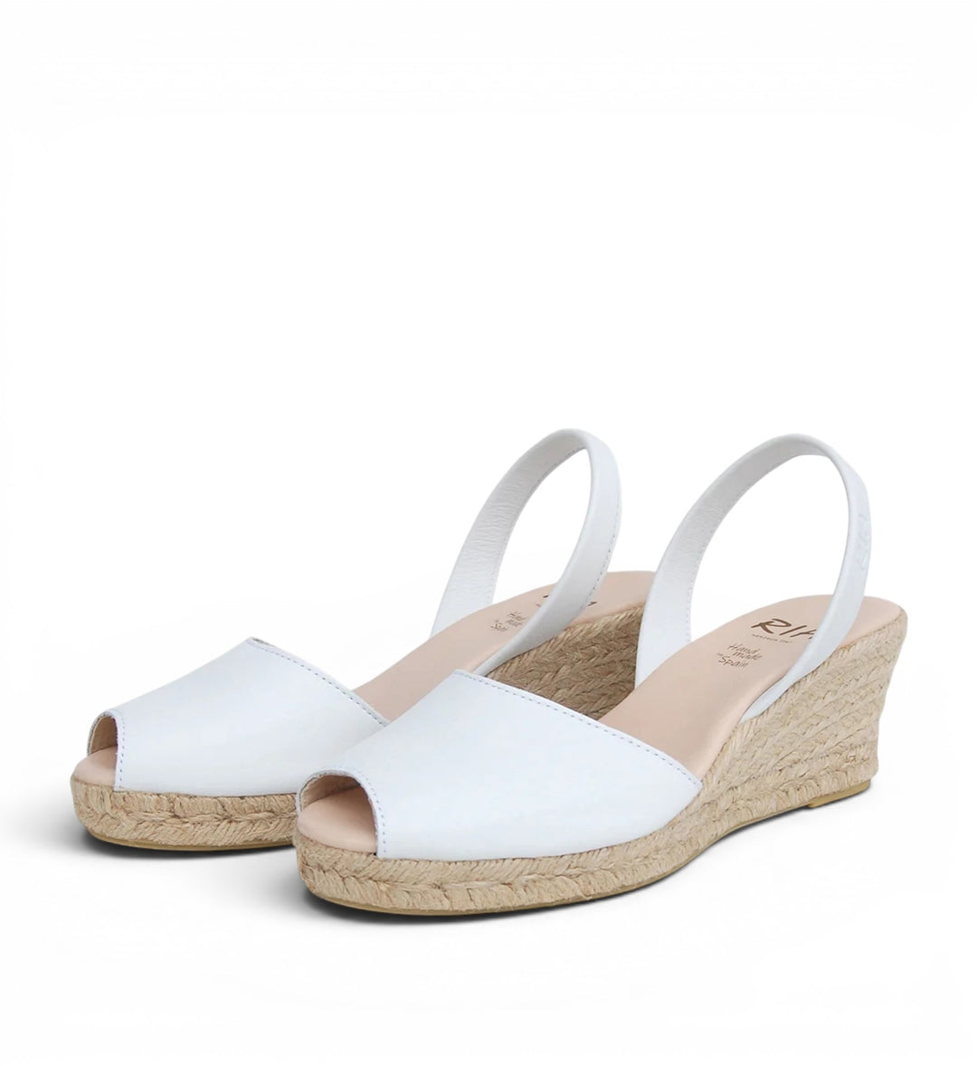 House of Florian white leather wedge espadrilles with peep toe and slingback strap.