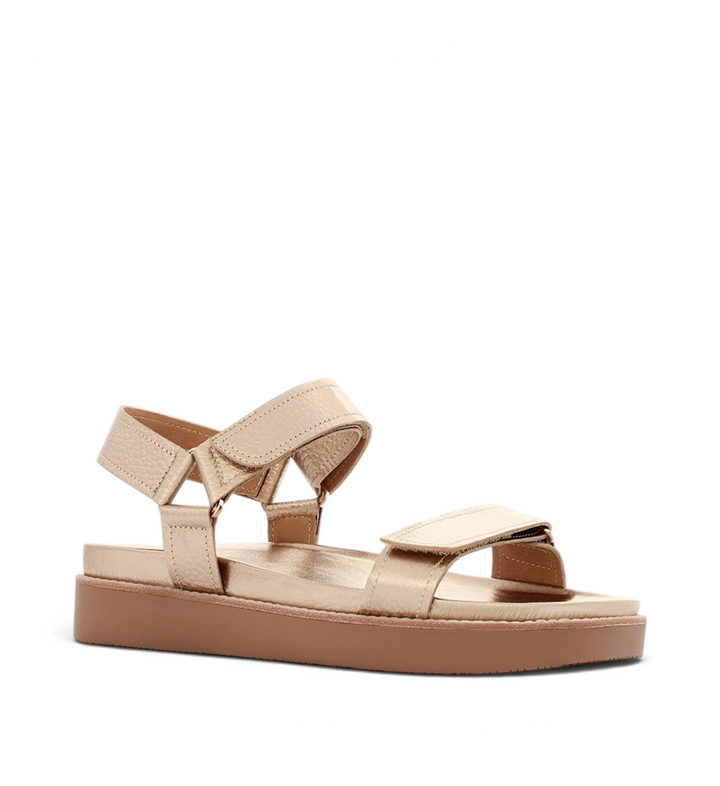 House of Florian Zane soft gold tumbled leather sandals with adjustable velcro straps and a thick platform sole.