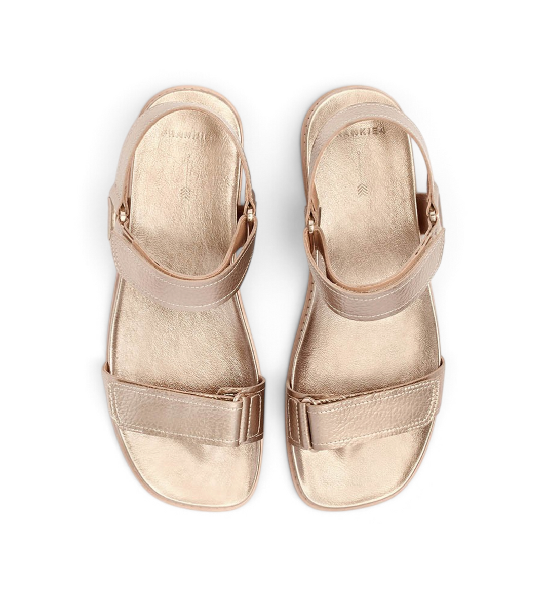 House of Florian Zane soft gold tumbled leather sandals with adjustable velcro straps, top-down view.